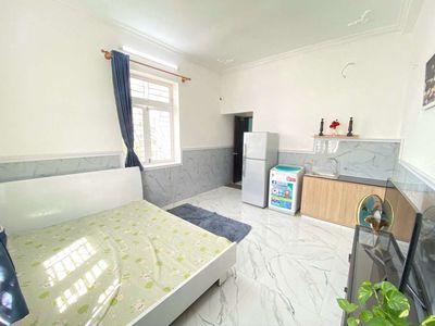 The room is wide, high-end furniture, with their own washing machine downtown.