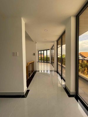 Two fronts with elevators, nice new houses, business.