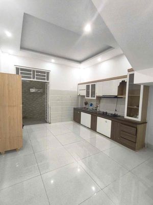 Three floors, four bedrooms, empty car tracks.