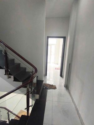 Three floors, four bedrooms, empty car tracks.
