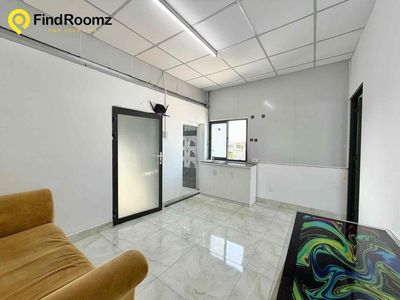 Two bedrooms. One living room. A bathroom with open windows.