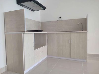 The corner of three bedrooms, two toilets, new. There's a kitchen, there's curtains.