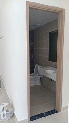 The corner of three bedrooms, two toilets, new. There's a kitchen, there's curtains.