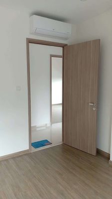 The corner of three bedrooms, two toilets, new. There's a kitchen, there's curtains.