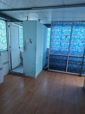 A one-man motel room.