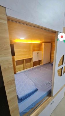 The Sleep Box dorm room is near the University of Medical College in the fifth district.
