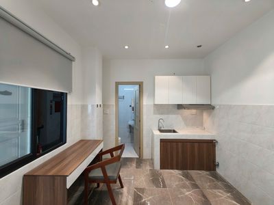 Rent a nice mini apartment right on the street of Lightup District 2.