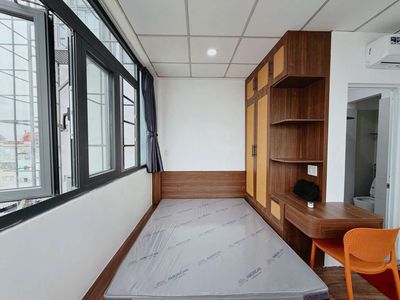 The elevator studio, the Full House Window, Nơ Trang Long, near the Great Literary School