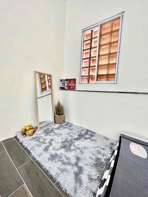 The service apartment is in Tân Bình County.
