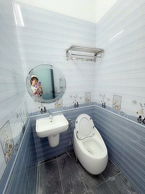 The street is right next to two bedrooms. Two toilets.