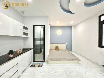 The Studio House of Peace Window