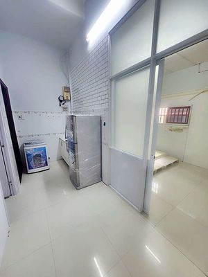 The service room has an interior of two bedrooms with a counter.