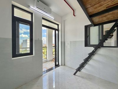 New boarding room with a balcony.