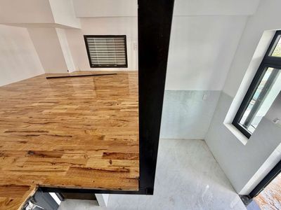 New boarding room with a balcony.