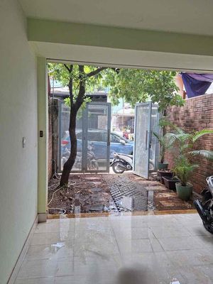 Tam Bình Torrene Village. Car parked in front of two bedrooms. Two full interior toilets.