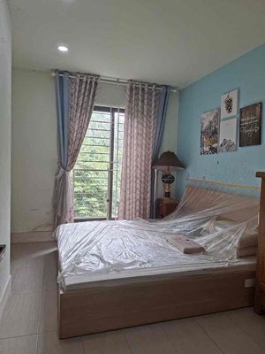 Tam Bình Torrene Village. Car parked in front of two bedrooms. Two full interior toilets.
