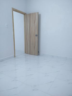 The apartment has a private, clean, secure bedroom.