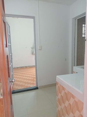 By the new market, District 7, nice room with air conditioning, windows, free car delivery.