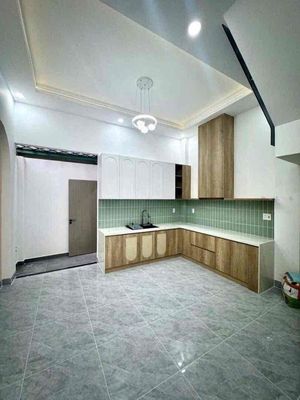 Three-story rent has four bedrooms with walled interiors.
