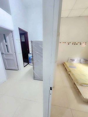 Room full of furniture is made up of two bedrooms with their own toilet kitchens.