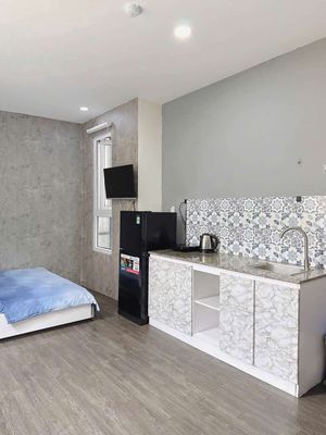 Rent an apartment full of furniture right into Saigon - 9 million a month.
