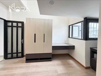 The apartment is full of furniture near the 10th District University of economics near the open ground.