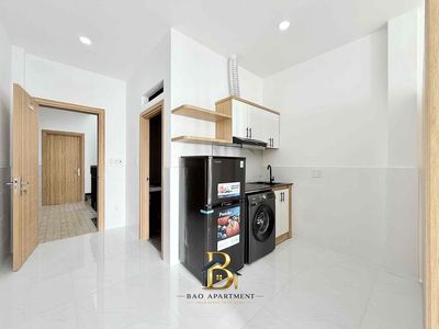 The balcony studio - full wash-up machine interior - right at Tân Hương.