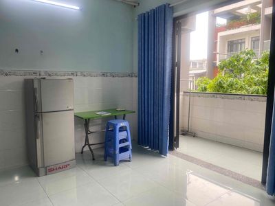 The room has a balcony on one floor.