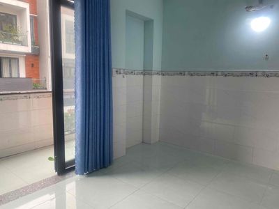 The room has a balcony on one floor.