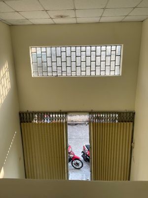 The full Hương Lộ 2 rental house, the car alley, the empty house.