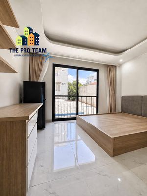 Large balcony studio - full interior near landmark