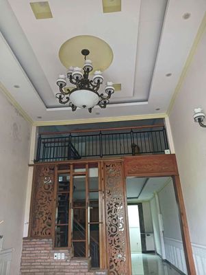 The owner of the painting hand over the house