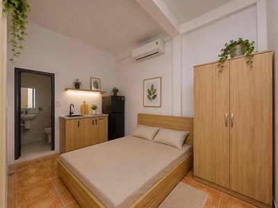 The studio is new interior -- right on Phạm Văn Hai -- the sandy side.