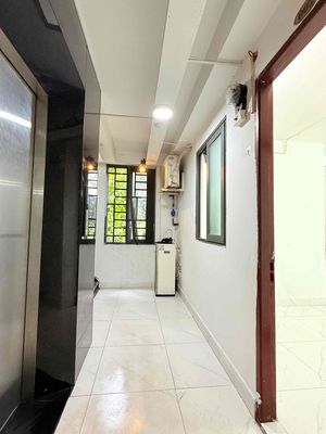 Rent us two open windows in a mini apartment.