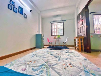 A master's bedroom separates ten + interiors like one of their own washing machines on the first floor.