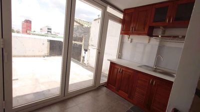 The balcony, the kitchen, the private washing machine.