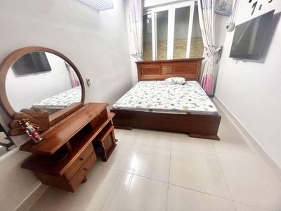 Home's empty, clean, full of furniture downtown.