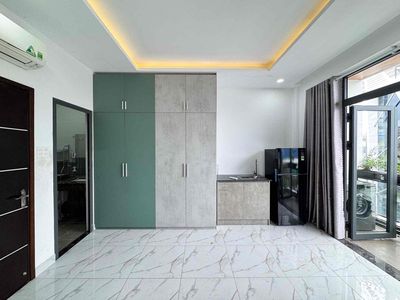 open the studio full of modern interiors with open window balcony