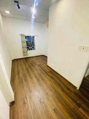 The main street. Two bedrooms. Two full interior toilets.