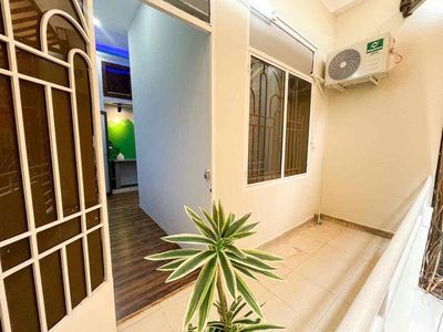 Two bedrooms have a balcony, a bathroom. A guest room.