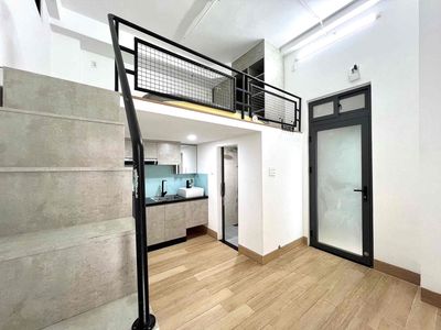 The apartment of the balcony is full of furniture near the intended park