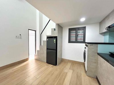 The apartment of the balcony is full of furniture near the intended park