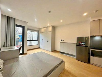 Rent the cool balcony studio right in District 10, full interior
