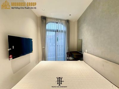 apartment one, bedroom one full interior. Bridge to District Three, room service.