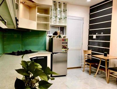 The service apartment is in the middle of the 1st district -- Trần Hưng Đạo -- near the metro.