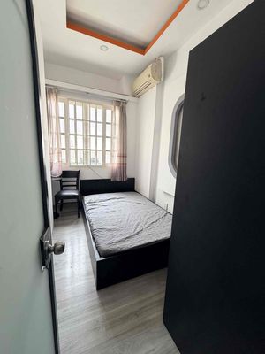 Two small bedrooms full of furniture in the vicinity of vhu tb