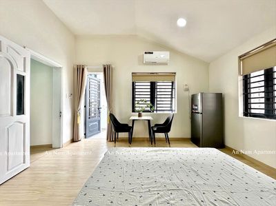 In one of the rooms, the kitchen room, the rooftops near the market, she just lost her new apartment.