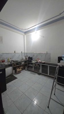 Room one of the men split the kitchen.