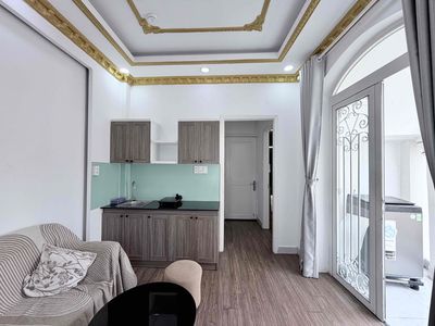 The 1st House has a living room. There's a 45-foot-two FullNT balcony at Phú Nhuận Falls.
