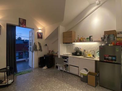 The apartment is a super wide balcony bedroom - full of furniture near Chen's brain